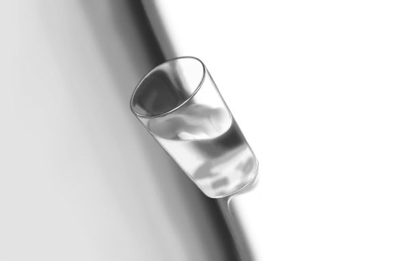 Glass of water half full, tilted, creating an impression of imbalance.